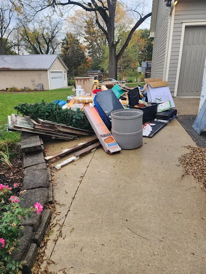 Dumpster being loaded with debris for Commercial Dumpster Rental in Northern Cambria